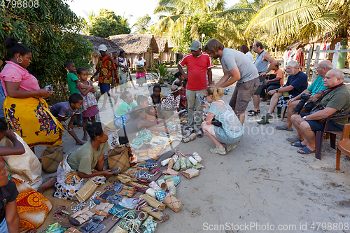 Image of Malagasy woman from village selling souvenir, Madagascar