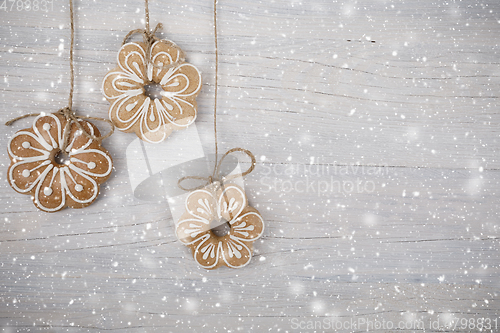 Image of Gingerbread cookies on wooden background