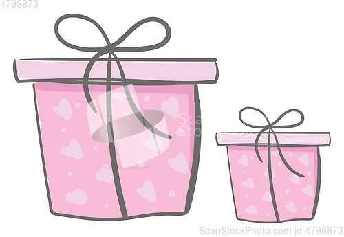 Image of Two different present boxes of different shapes wrapped in pink 