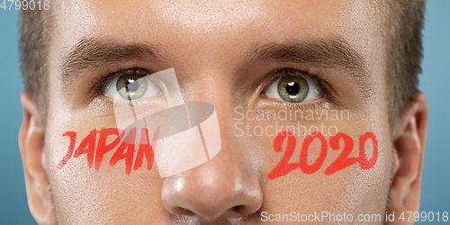 Image of Caucasian young man\'s close up portrait on bright background, Tokyo 2020