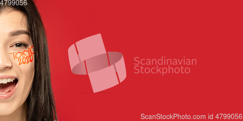 Image of Caucasian young woman\'s close up portrait on bright background, Tokyo 2020