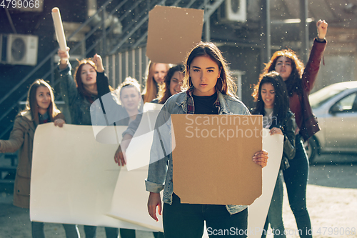 Image of Young people protesting of women rights and equality on the street