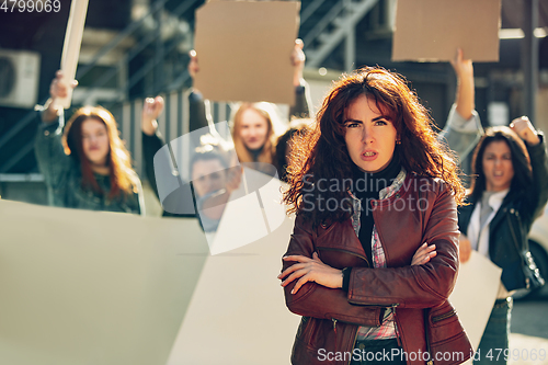 Image of Young people protesting of women rights and equality on the street