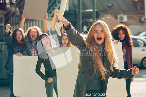 Image of Young people protesting of women rights and equality on the street