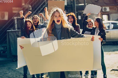 Image of Young people protesting of women rights and equality on the street