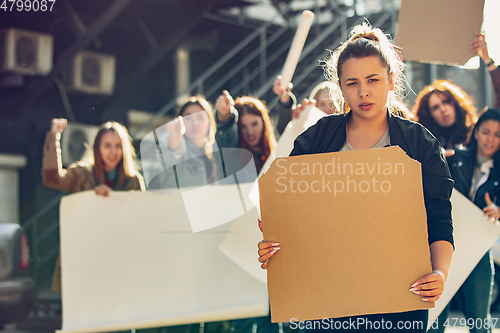 Image of Young people protesting of women rights and equality on the street