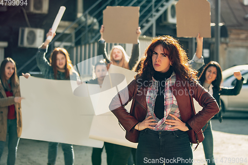Image of Young people protesting of women rights and equality on the street