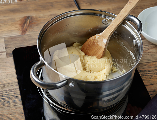 Image of eclair dough in a pot