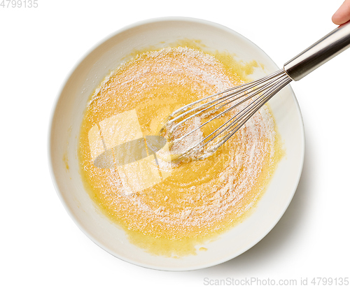 Image of bowl of mixed egg yolks and sugar with corn starch