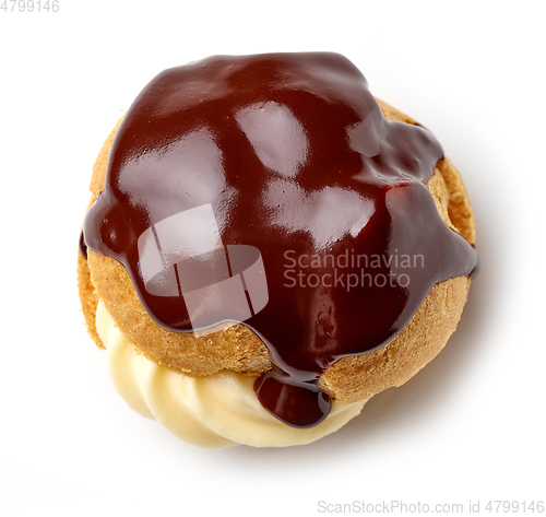 Image of cream puff covered with melted chocolate