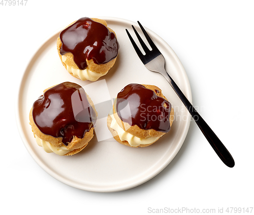 Image of plate of freshly baked cream puffs