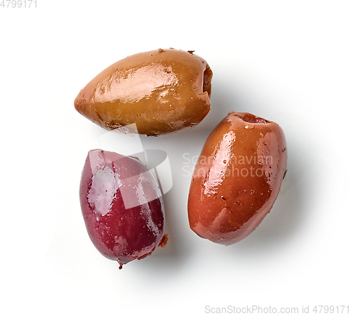 Image of various pickled olives macro