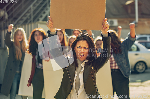 Image of Young people protesting of women rights and equality on the street