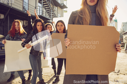 Image of Young people protesting of women rights and equality on the street