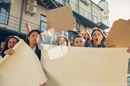 Image of Young people protesting of women rights and equality on the street