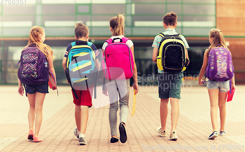 Image of group of happy elementary school students walking