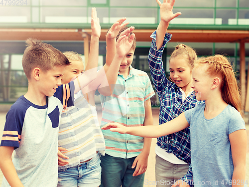 Image of group of happy elementary school students