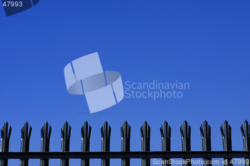 Image of Tops of metal palisade fencing