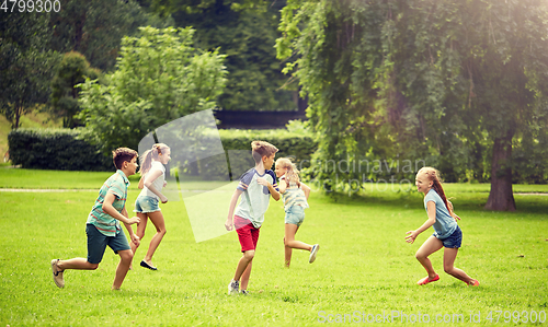 Image of happy kids running and playing game outdoors