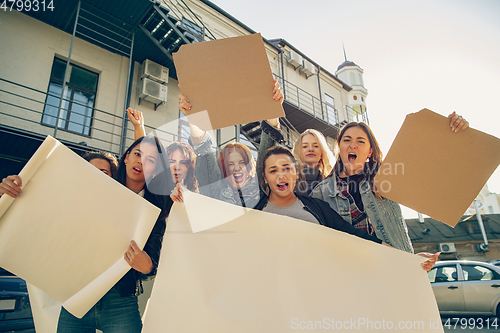 Image of Young people protesting of women rights and equality on the street