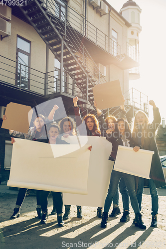 Image of Young people protesting of women rights and equality on the street