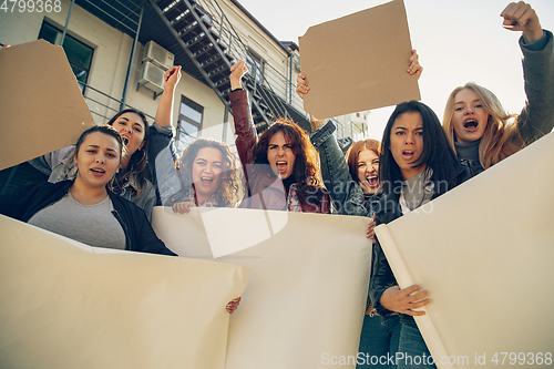 Image of Young people protesting of women rights and equality on the street