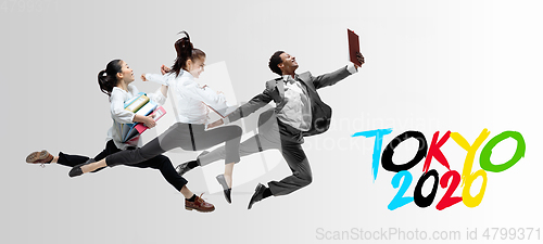 Image of Office workers or ballet dancers jumping on white background