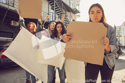 Image of Young people protesting of women rights and equality on the street