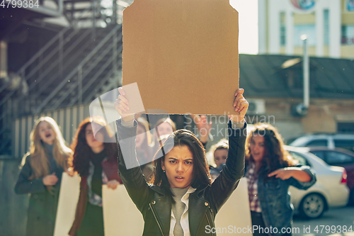 Image of Young people protesting of women rights and equality on the street