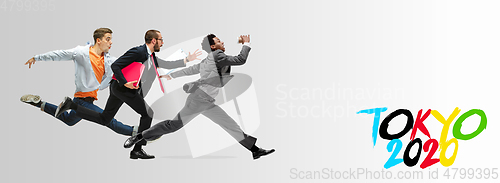 Image of Office workers or ballet dancers jumping on white background