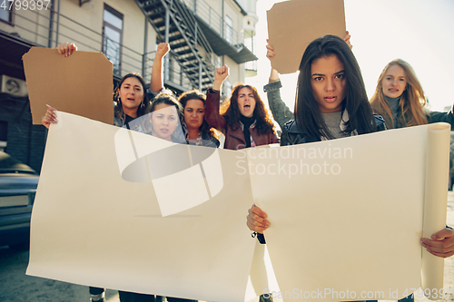 Image of Young people protesting of women rights and equality on the street