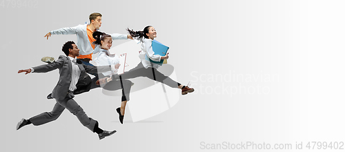 Image of Office workers or ballet dancers jumping on white background