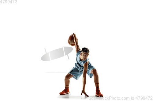 Image of Full length portrait of a young basketball player with ball