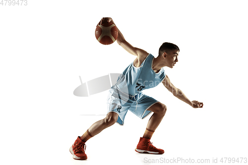 Image of Full length portrait of a young basketball player with ball