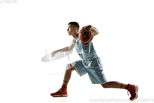 Image of Full length portrait of a young basketball player with ball