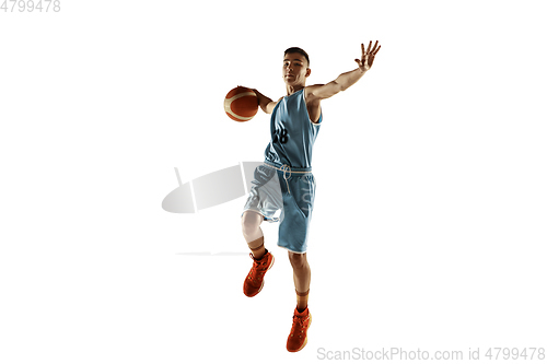 Image of Full length portrait of a young basketball player with ball