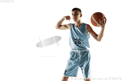 Image of Full length portrait of a young basketball player with ball