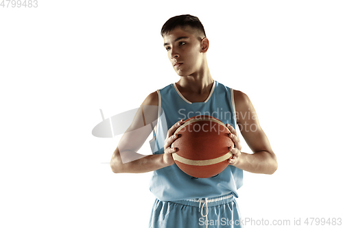 Image of Full length portrait of a young basketball player with ball