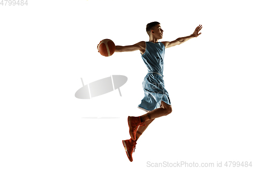 Image of Full length portrait of a young basketball player with ball