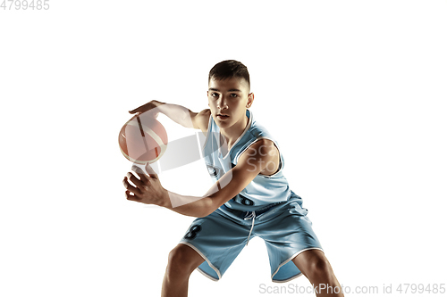 Image of Full length portrait of a young basketball player with ball