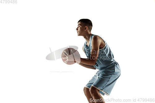 Image of Full length portrait of a young basketball player with ball