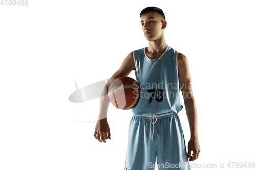 Image of Full length portrait of a young basketball player with ball