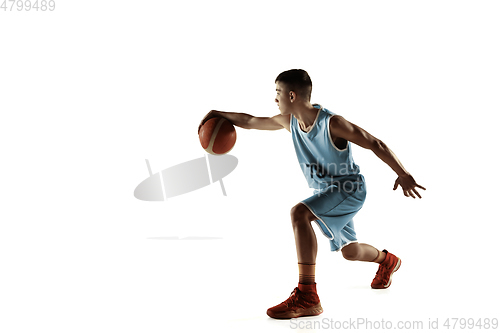 Image of Full length portrait of a young basketball player with ball