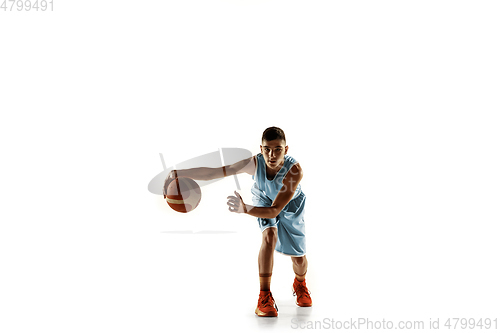 Image of Full length portrait of a young basketball player with ball