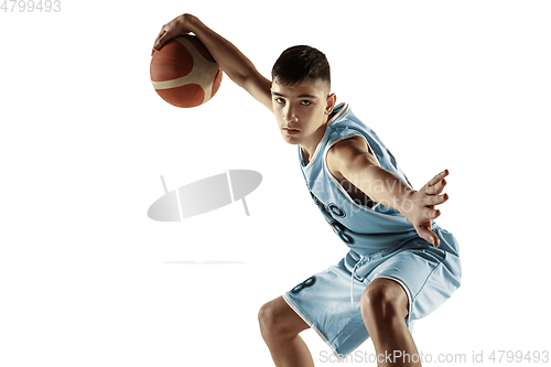 Image of Full length portrait of a young basketball player with ball