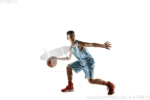 Image of Full length portrait of a young basketball player with ball