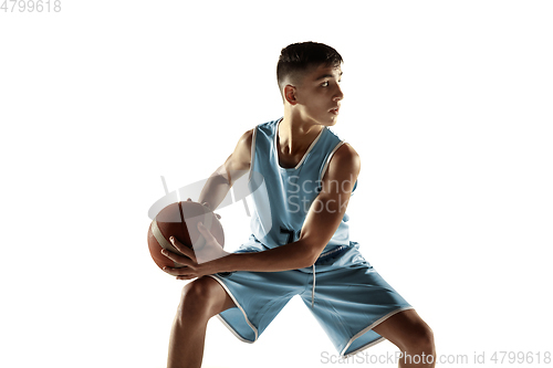 Image of Full length portrait of a young basketball player with ball
