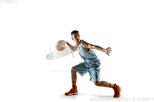 Image of Full length portrait of a young basketball player with ball