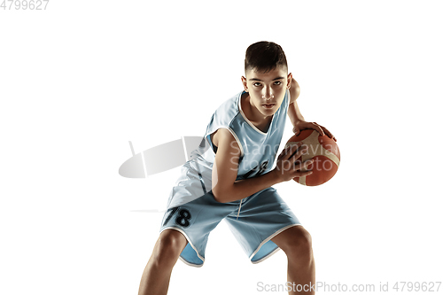 Image of Full length portrait of a young basketball player with ball