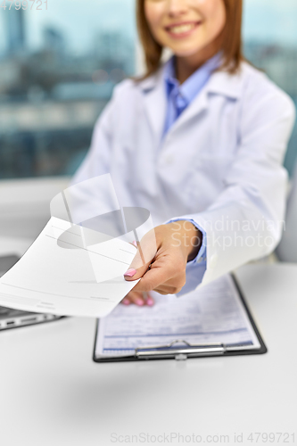 Image of close up of doctor with prescription at hospital